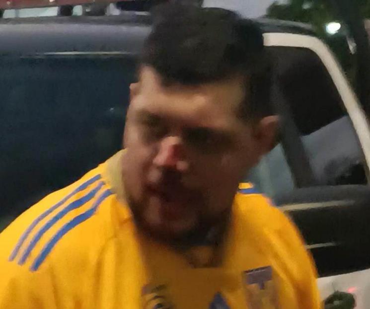 Golpean a aficionado de Tigres afuera del Estadio BBVA