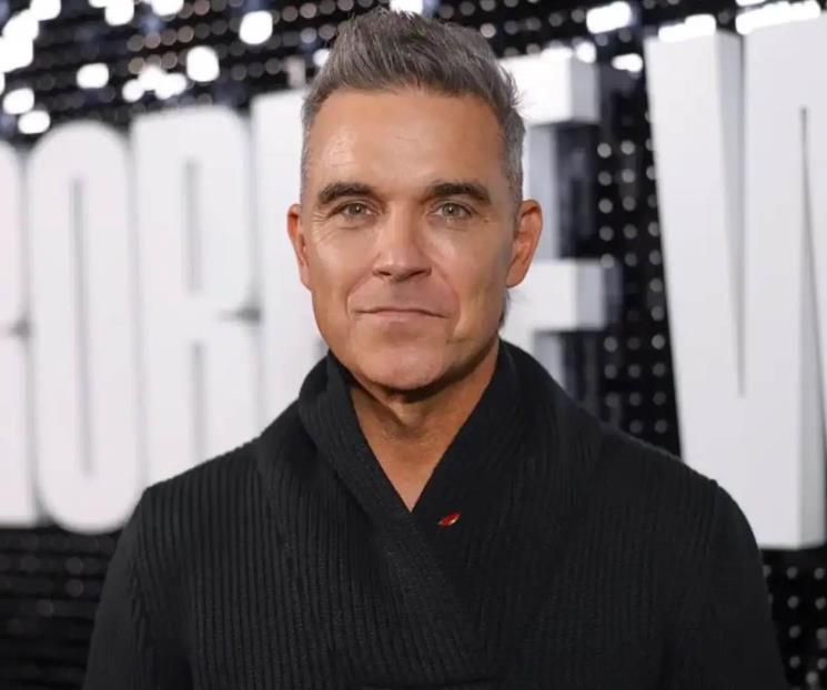 Robbie Williams confiesa que era un adicto y debía 380mdd