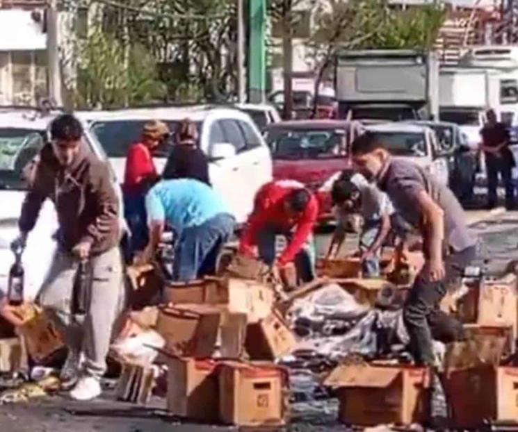 Se lleva tren a tráiler que cargaba cerveza