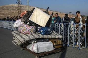 Cientos de sirios hacen fila en la frontera turca para volver a casa
