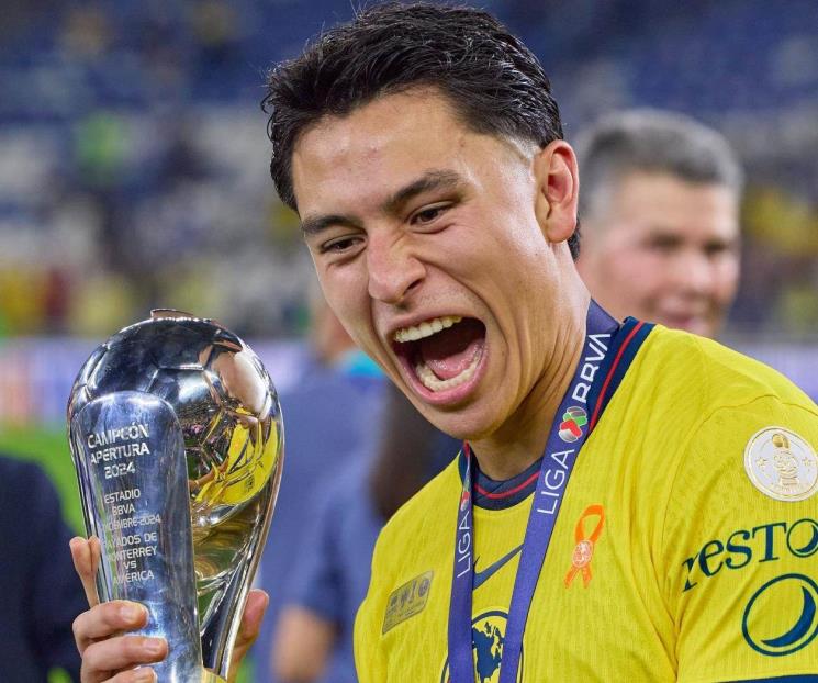 Jugadores de América, felices por el tricampeonato